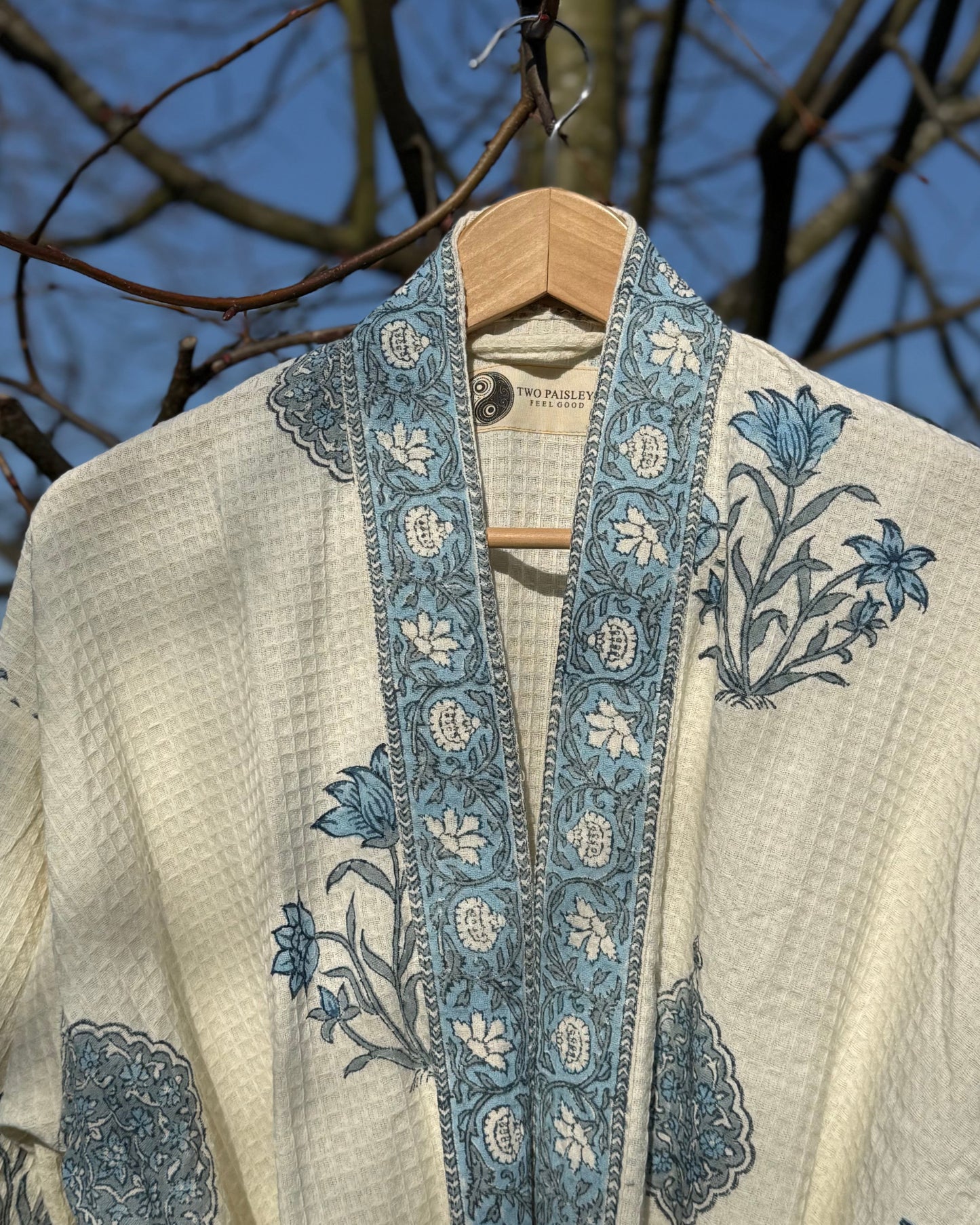 Dusky blue floral motifs hand block printed on soft cream waffle