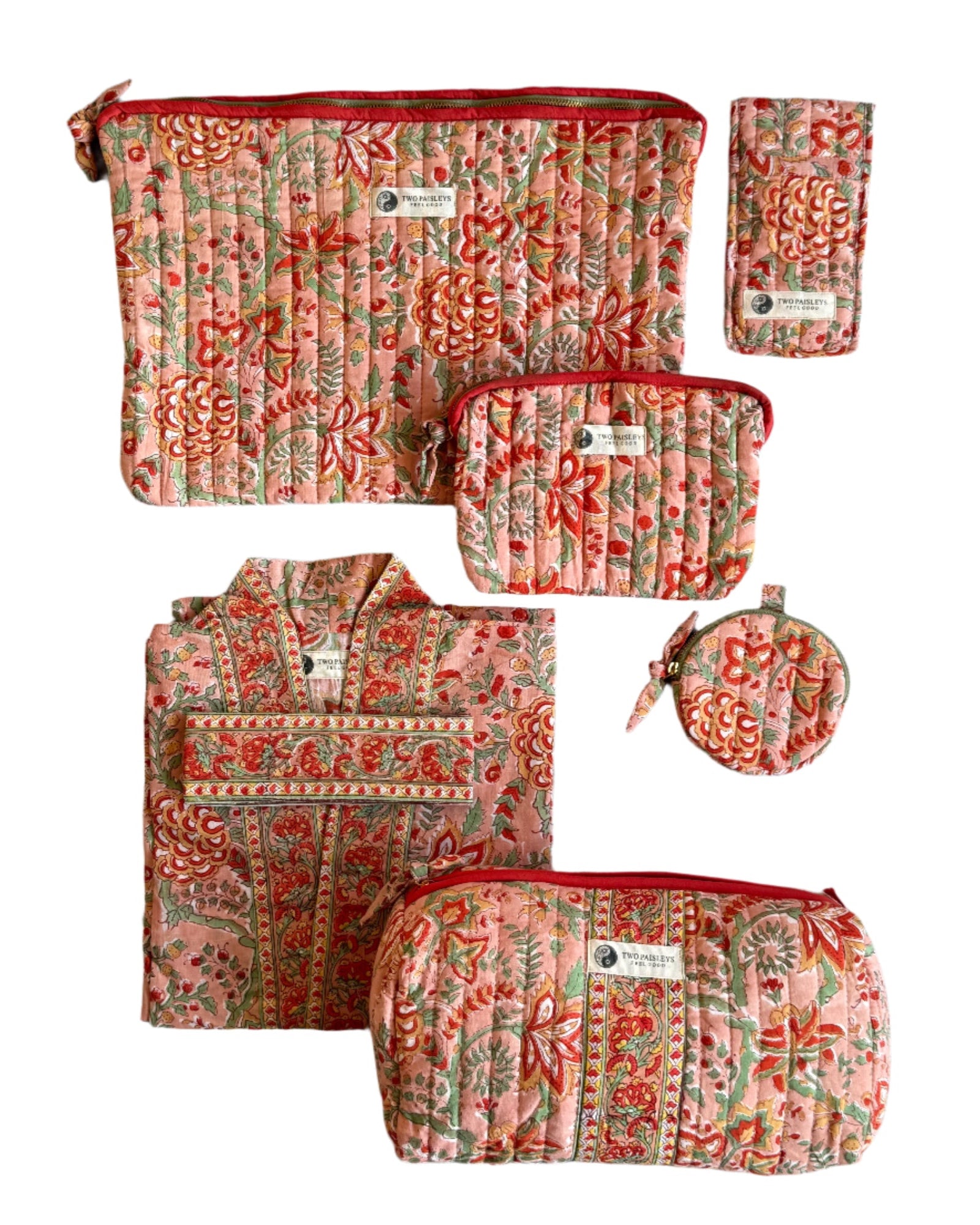 Set of matching  floral-patterned bags on a white background