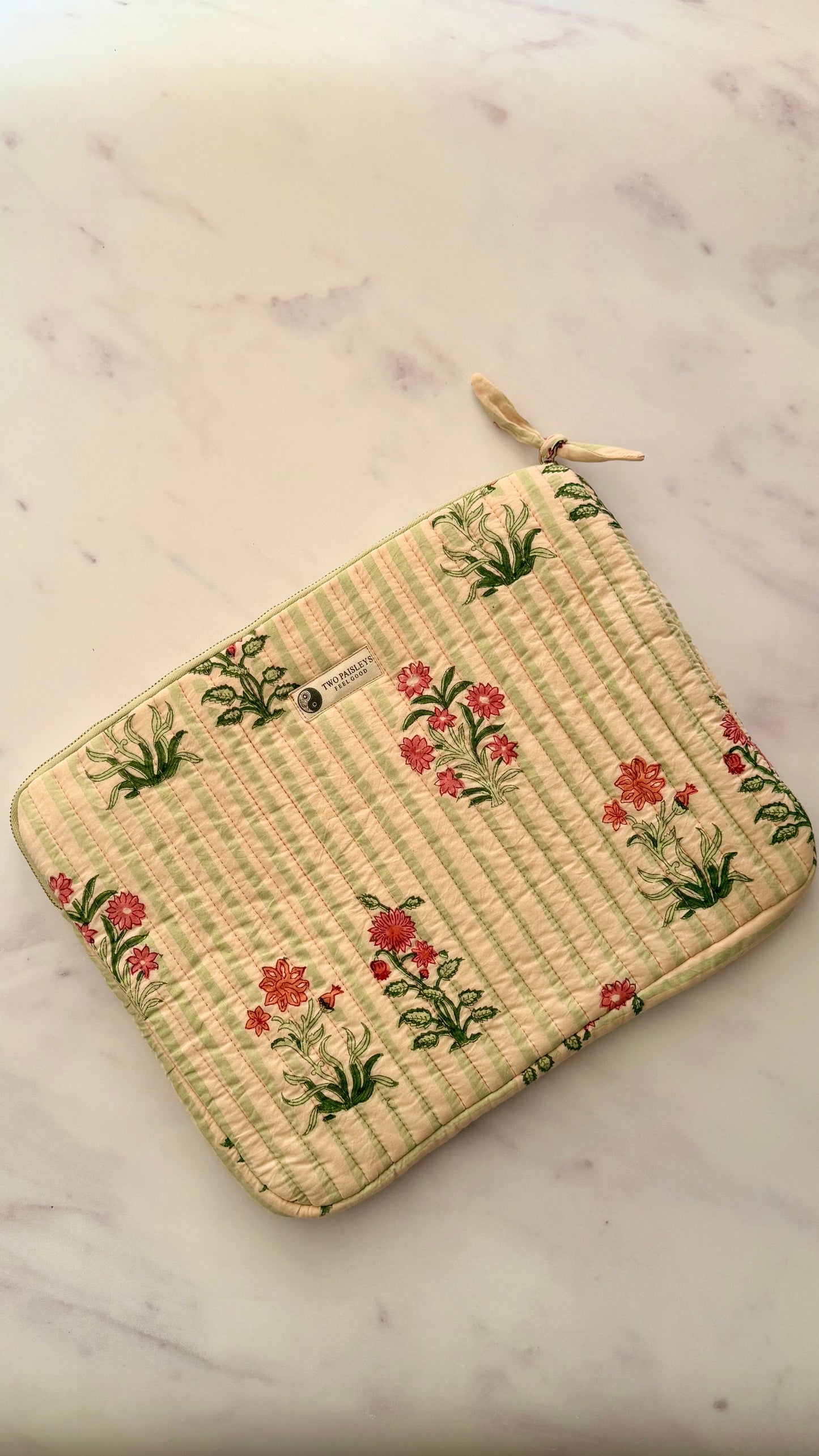 Green & light peach striped floral quilted laptop sleeve.