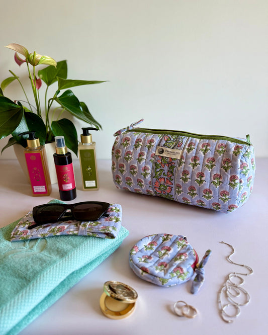 Matching pouch and wash bag set in soft pink and green florals
