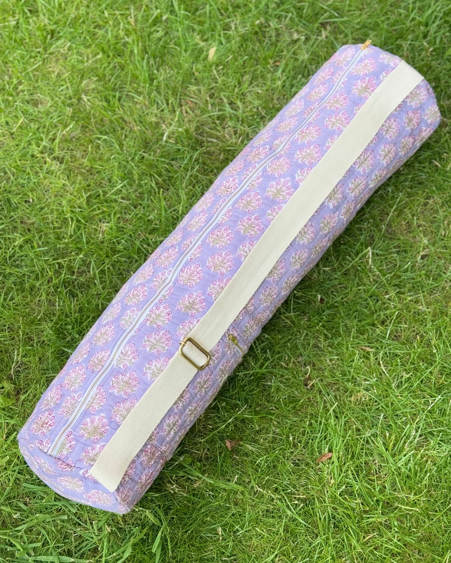 Yoga Mat Cover with Adjustable Strap on grass