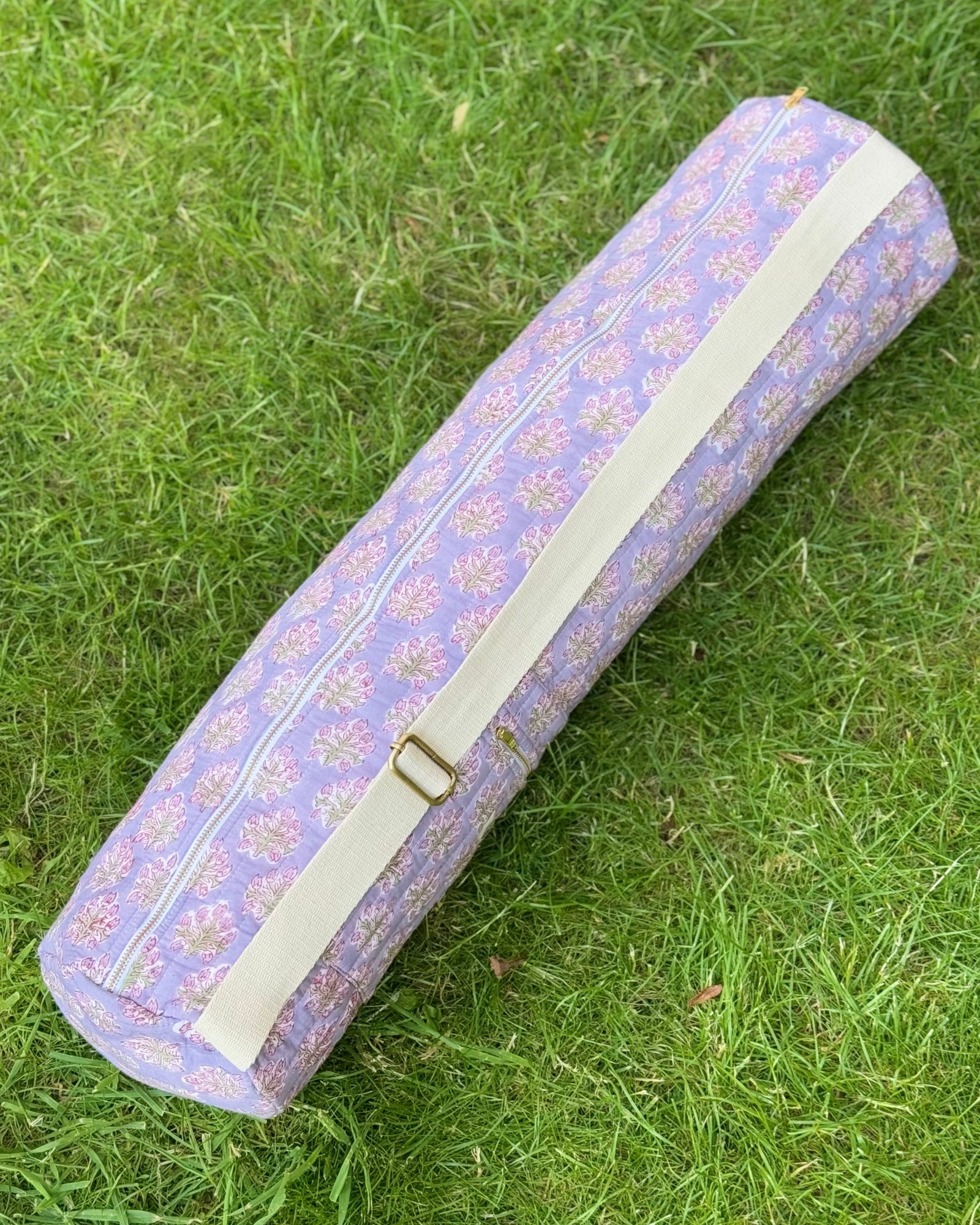 Yoga Mat Cover with Adjustable Strap on grass