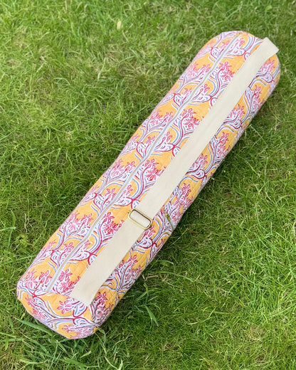 Yoga Mat cover with adjustable strap with floral pattern on grass