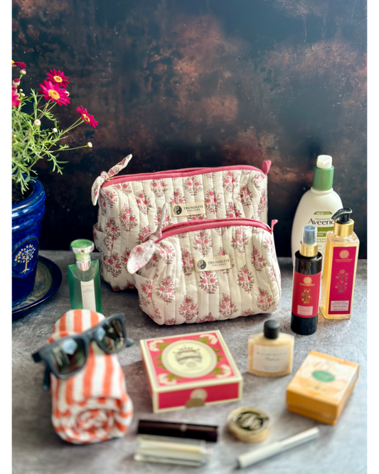 Vintage Floral Quilted Wash Bag styled with cosmetics and toiletries.