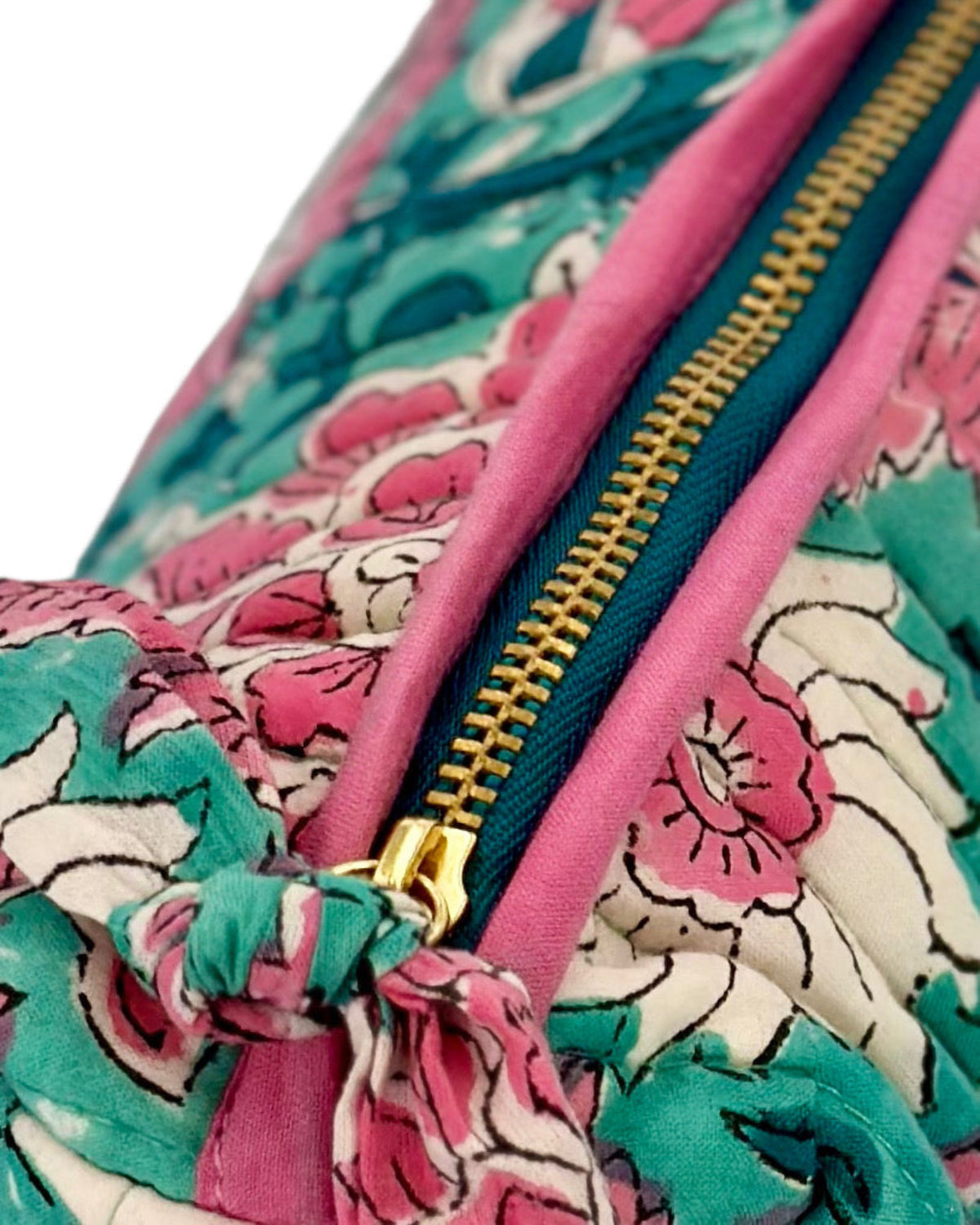 Topshot Of The Garden of Eden Floral  Quilted Makeup Bag Showing The Golden & Green Zip 